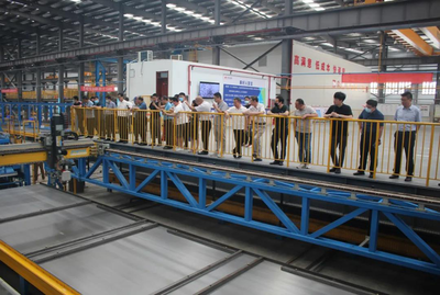 技术融合与产业升级 新乡市绿色建筑协会调研美好房屋智造工厂